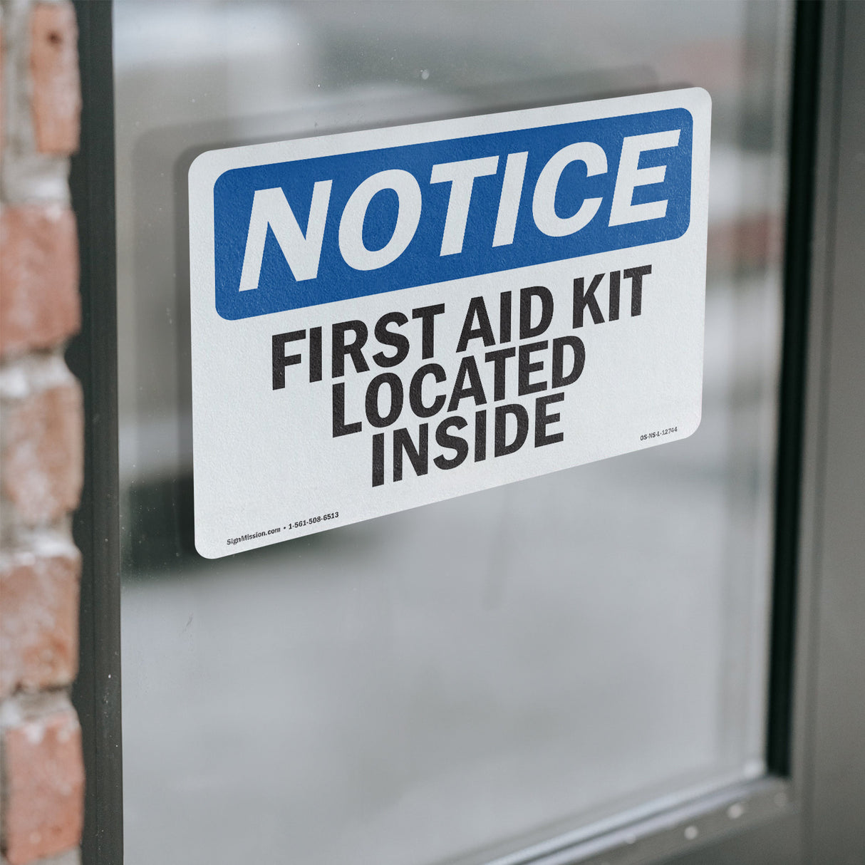 First Aid Kit Located Inside Sign
