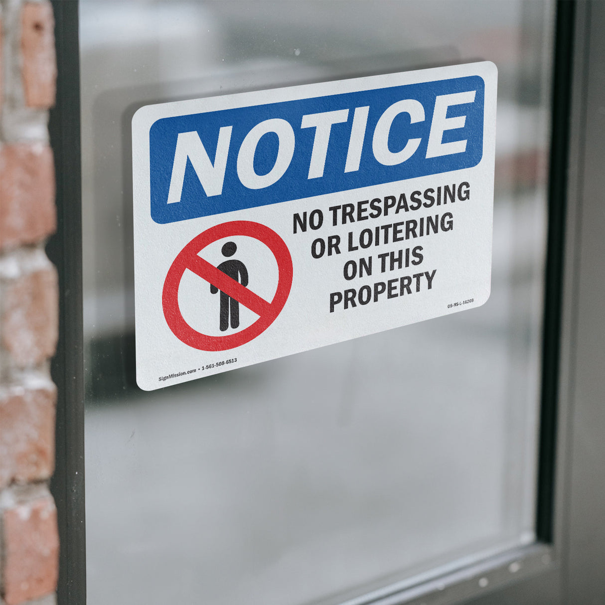 NOTICE No Trespassing Or Loitering On This Property