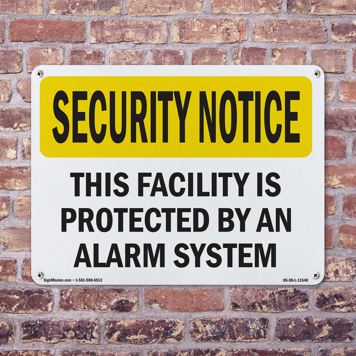 Facility Protected By Alarm Spanish