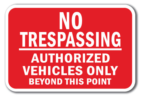No Trespassing Authorized Vehicles Only Beyond This Point