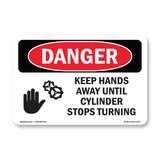 Keep Hands Away Until Cylinder Stops Turning