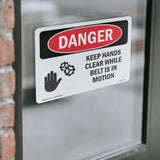 Keep Hands Clear While Belt Is In Motion