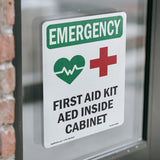 First Aid Kit AED Inside Cabinet With Symbol