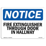 Fire Extinguisher Through Door In Hallway