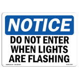 NOTICE Do Not Enter When Lights Are Flashing