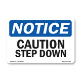 Caution Step Down Sign