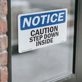 Caution Step Down Inside