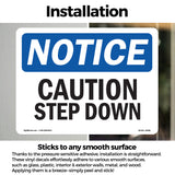 Caution Step Down Sign