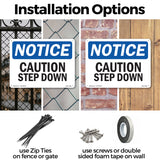 Caution Step Down Sign