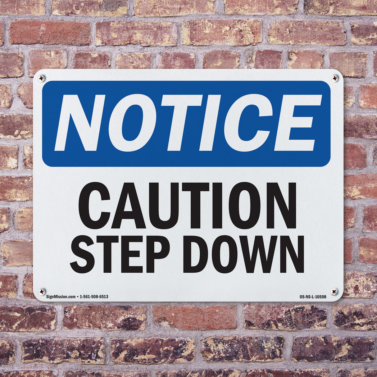 Caution Step Down Sign