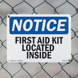 First Aid Kit Located Inside Sign