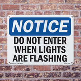 NOTICE Do Not Enter When Lights Are Flashing