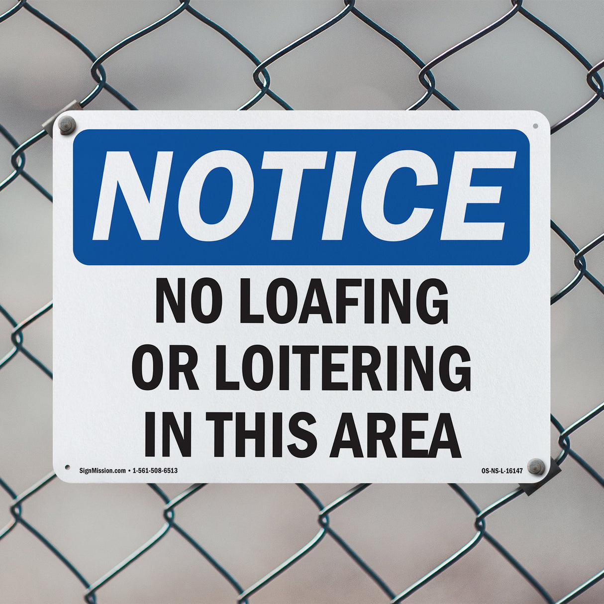 NOTICE No Loafing Or Loitering In This Area