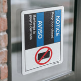 Notice Keep Door Closed (Bilingual Spanish)