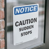 Caution Sudden Stops Sign