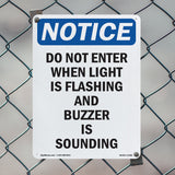 Do Not Enter When Light Is Flashing And Sign