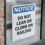 Do Not Lean Or Climb On Railing Sign