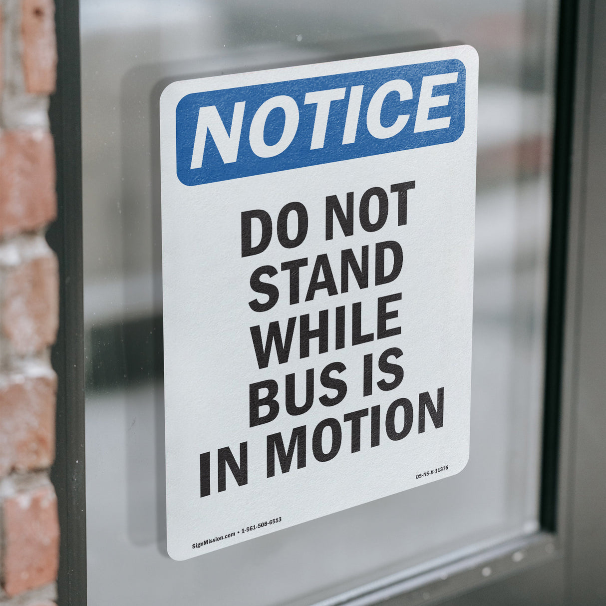 Do Not Stand While Bus Is In Motion Sign