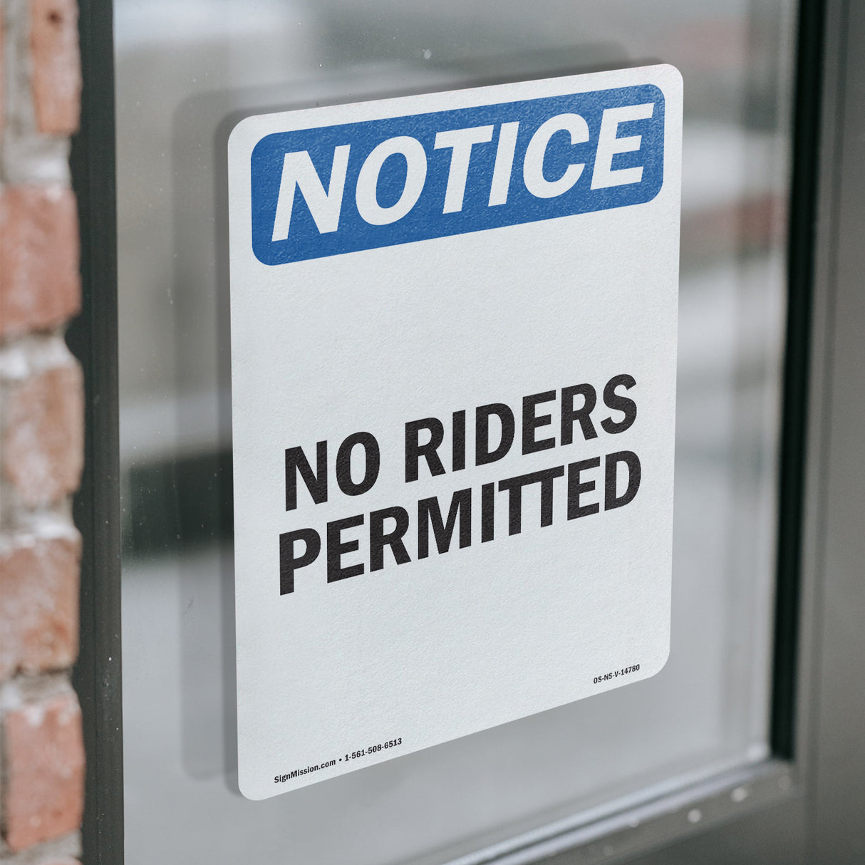 No Riders Permitted Sign