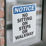 No Sitting On Steps Or Walkway