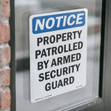 NOTICE Patrolled By Armed Security Guard