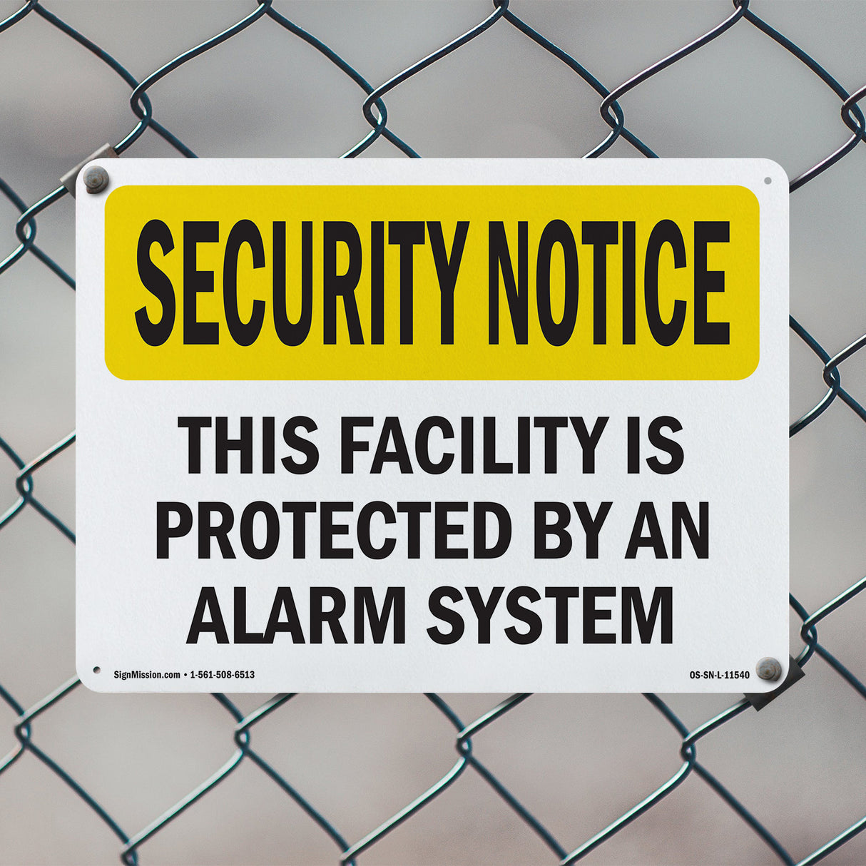 Facility Protected By Alarm Spanish
