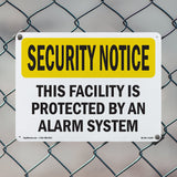 Facility Protected By Alarm Spanish