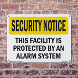 Facility Protected By Alarm Spanish