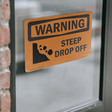 Steep Drop Off With Symbol