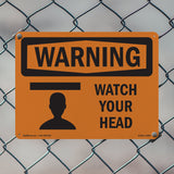 Watch Your Head Spanish