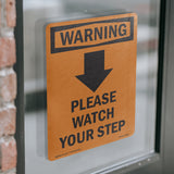 Please Watch Your Step [Down Arrow] With Symbol