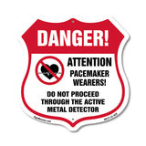 Pacemaker Wearers Danger! Attention Pacemaker Wearers. Do Not Proceed Through The Active Metal Detector