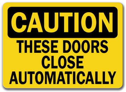Caution Sign - These Doors Close Automatically