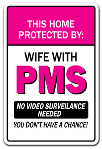 THIS HOME PROTECTED BY WIFE WITH PMS Sign