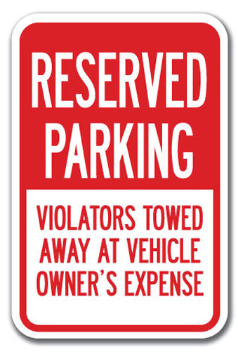 Reserved Parking Violators Towed Away At Vehicle